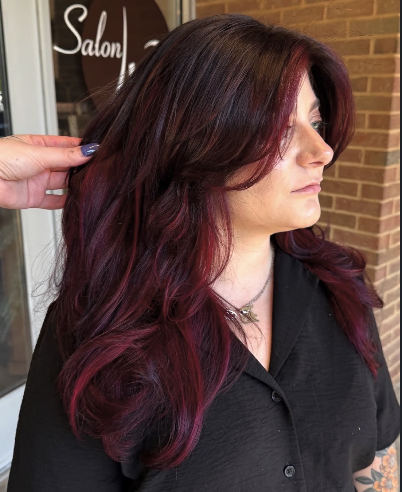 Long burgundy waves with violet undertones