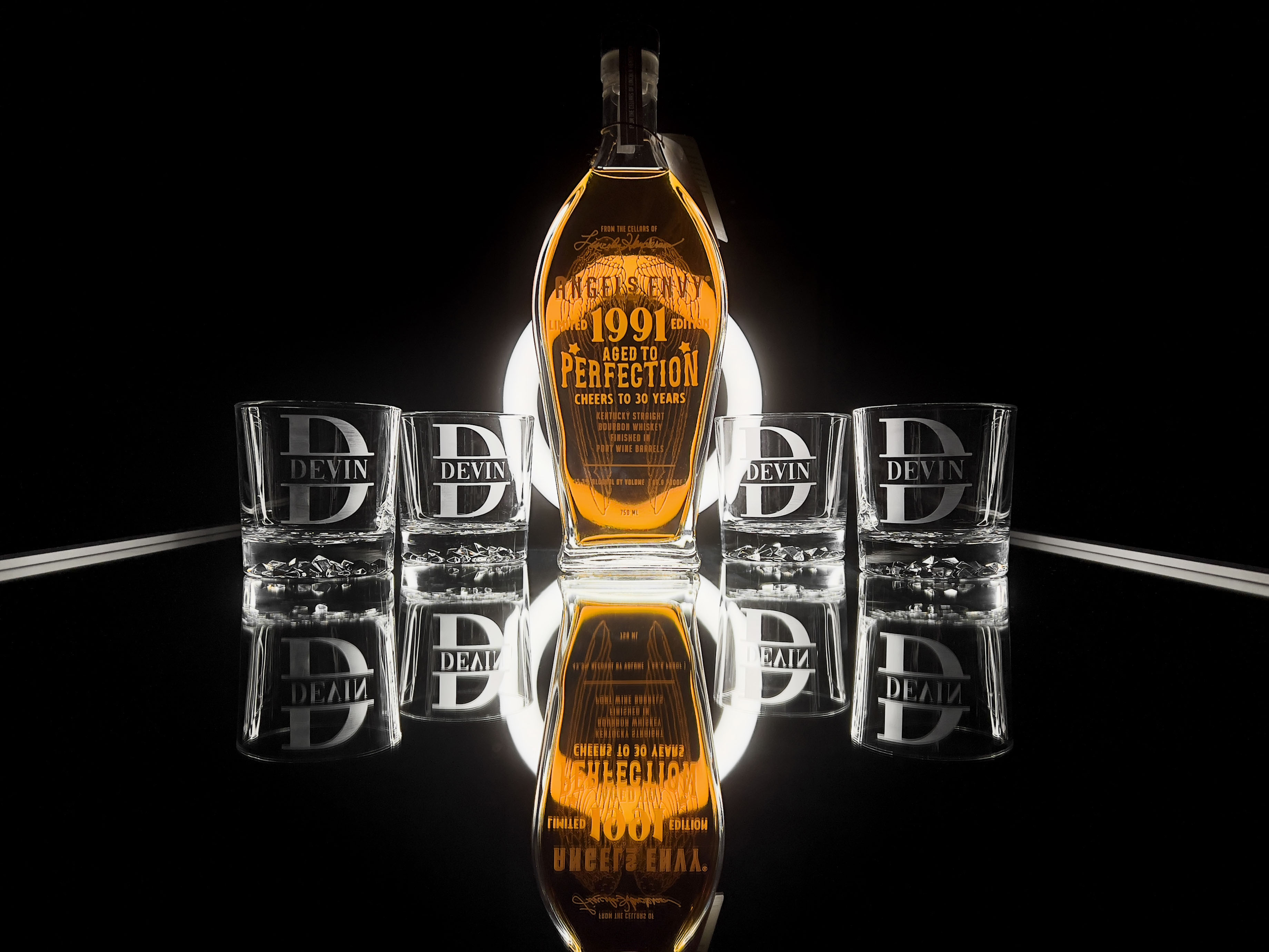 Custom etched whiskey glasses